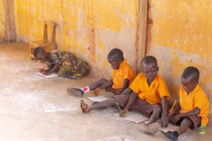 Kids writing on the floor